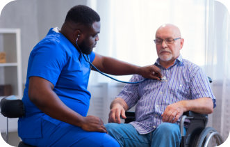 a male nurse with an elderly man