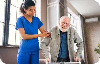 a female nurse assisting an elderly man